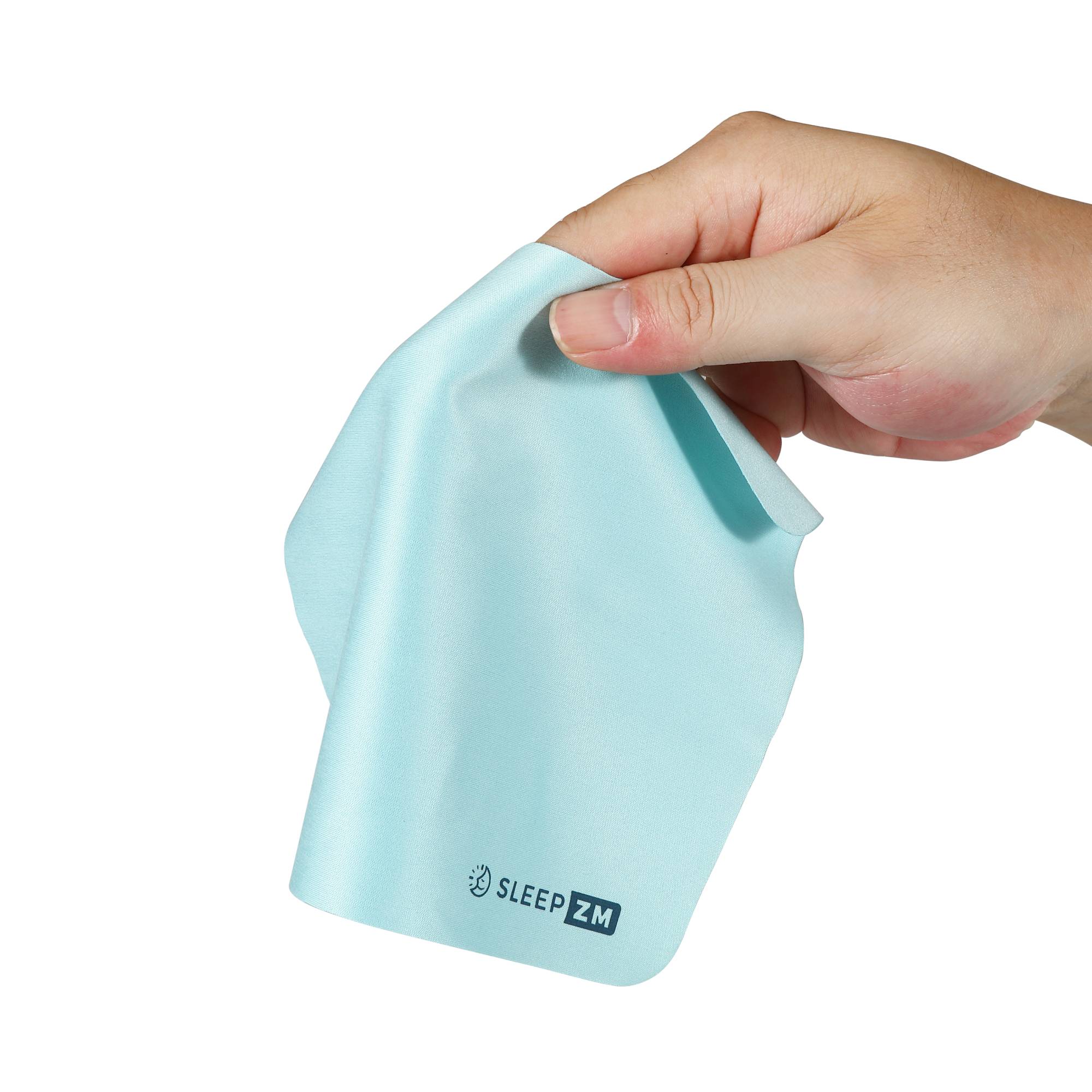 Light blue silicone product held by a hand with 'Sleep ZM' branding on a white background