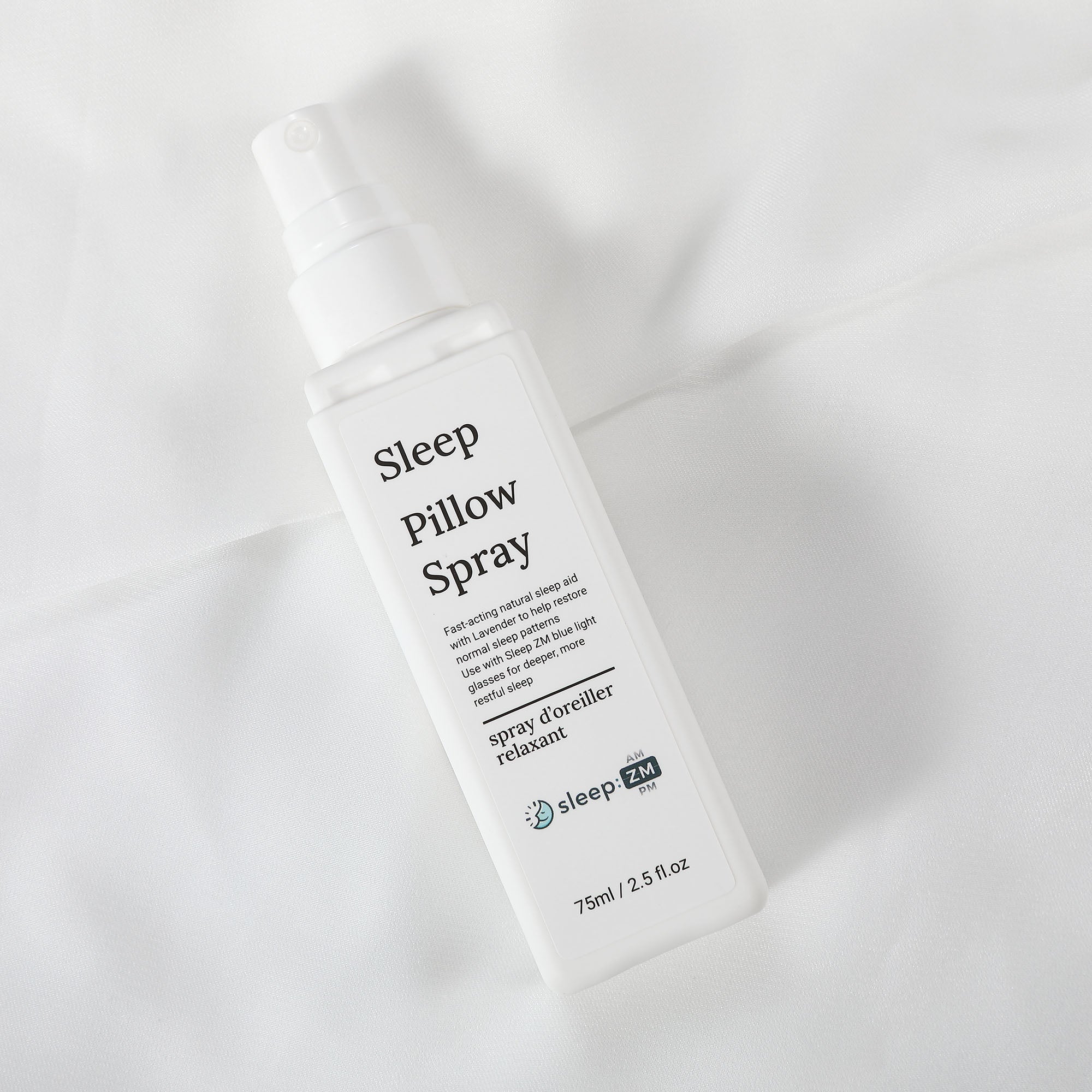 Sleep Pillow Spray bottle on a light fabric background