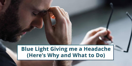 Man holding his glasses and rubbing his forehead
