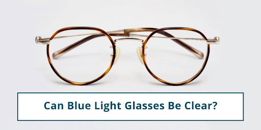 Round gold-framed glasses with clear lenses