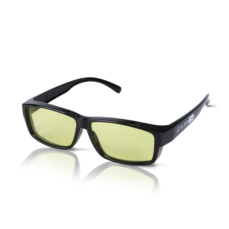 Black DaytimeMAX fit‑over blue light blocking glasses worn over prescription frames