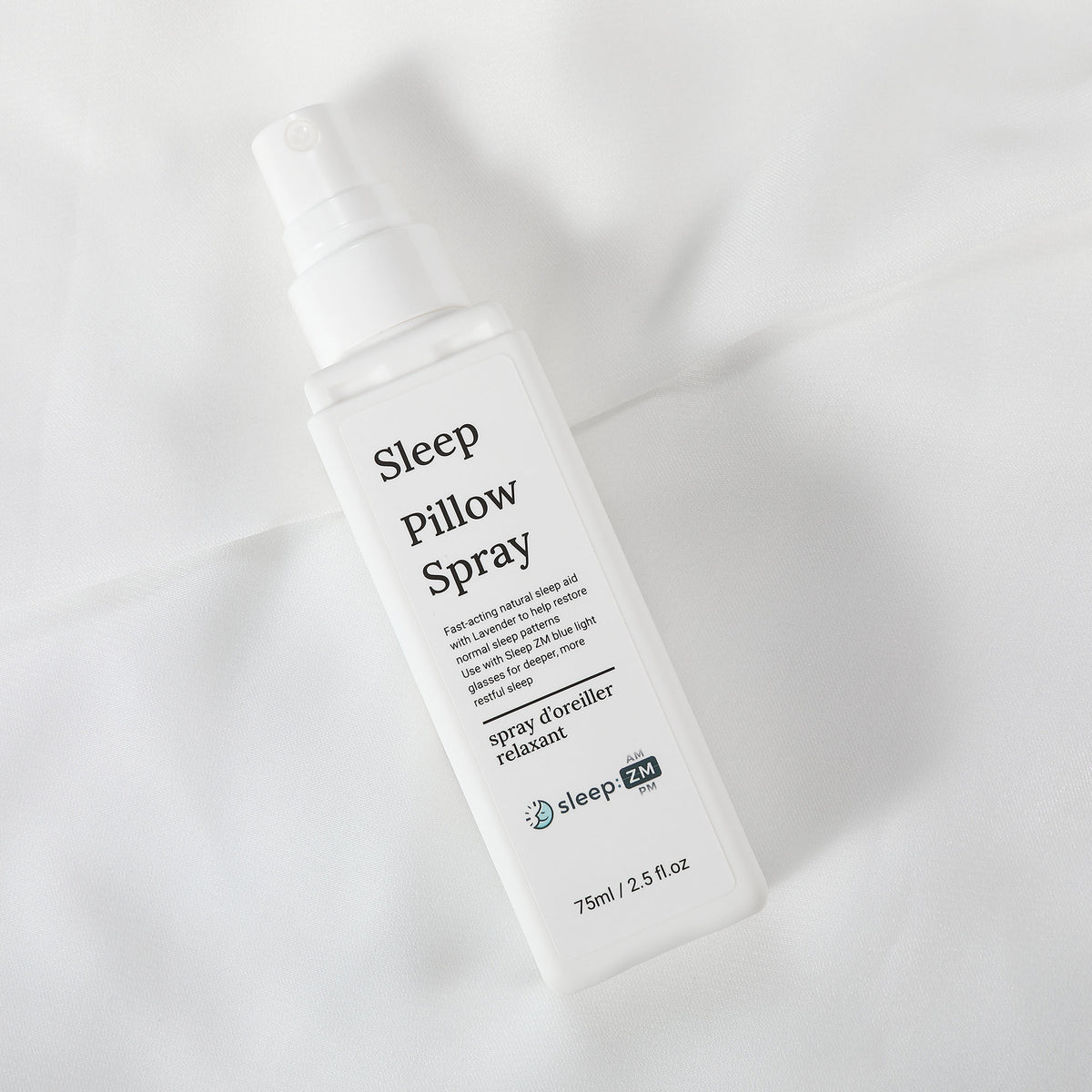 Sleep Pillow Spray bottle on a light fabric background