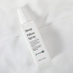 Sleep Pillow Spray bottle on a light fabric background